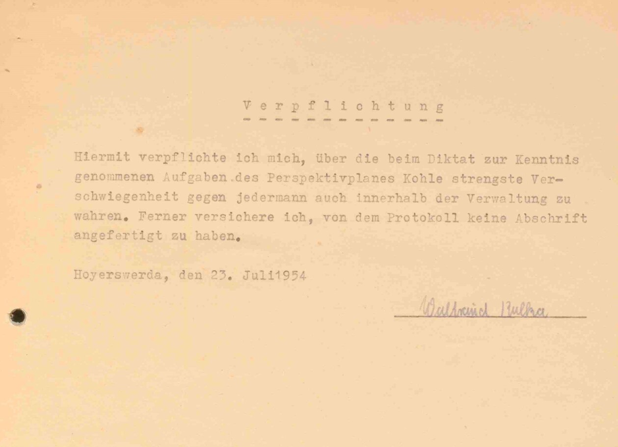 Foto eines historischen Dokumentes, einer Verschwiegenheitserklärung: (Protokoll einer Besprechung des Perspektivplans Kohle am 23. Juli 1954)